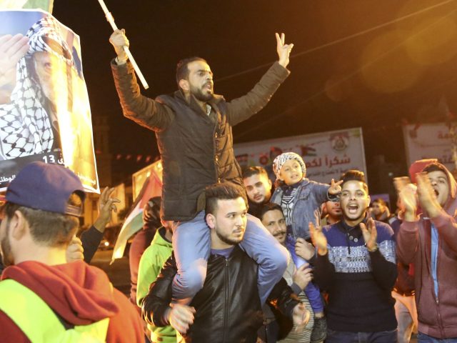 Protests in Gaza City following the news (Adel Hana/AP)