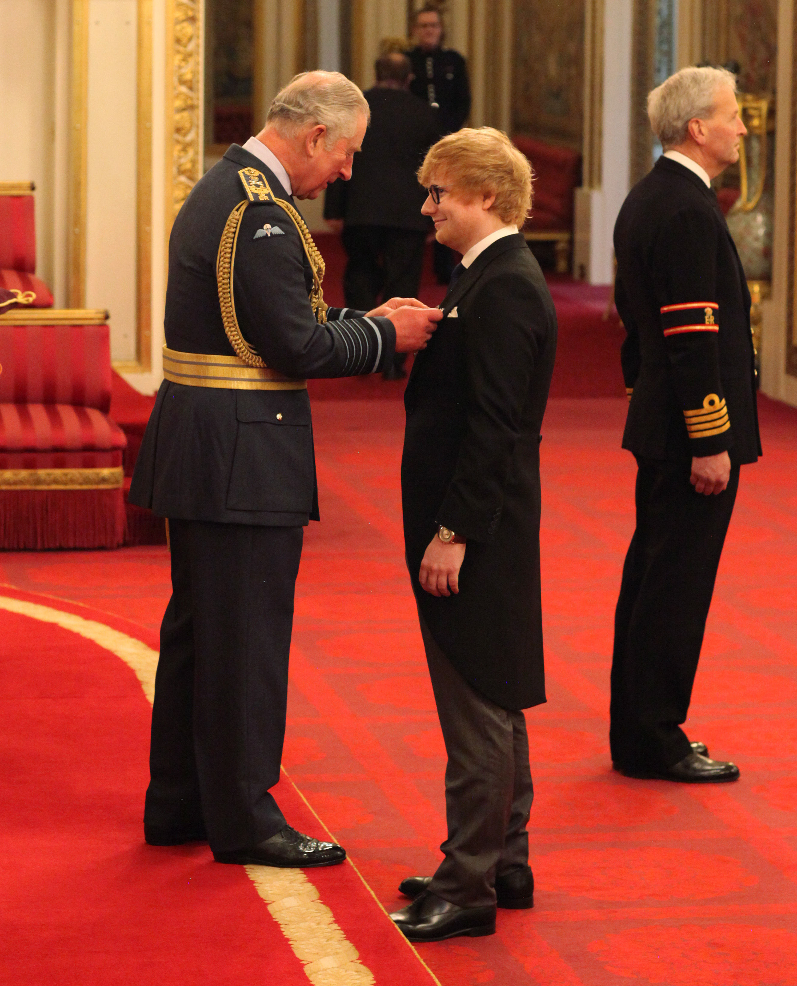 Ed Sheeran is made an MBE by the Prince of Wales at a Buckingham Palace (Yui Mok/PA)