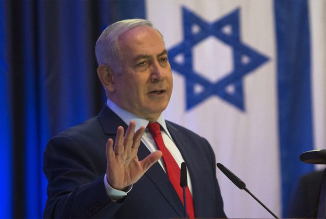 Israeli PM Benjamin Netanyahu has welcomed the move (Sebastian Scheiner/AP)