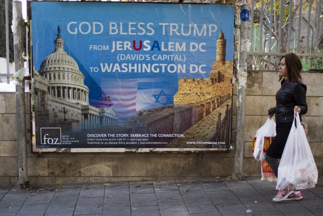 A poster praising US president Donald Trump in Jerusalem (Ariel Schalit/AP)