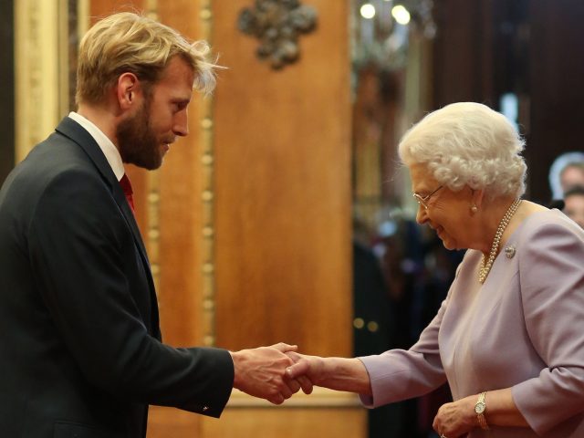 Andrew Triggs Hodge receives his OBE at Windsor Castle (Jonathan Brady/PA)