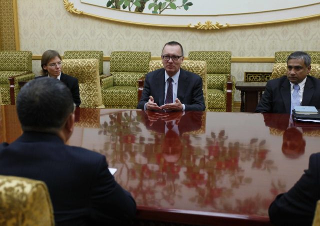 Jeffrey Feltman, centre, meets with North Korean Foreign Minister Ri Yong Ho (AP Photo/Jon Chol Jin)