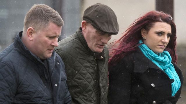 Leader of Britain First, Paul Golding (left), with Deputy leader Jayda Fransen (right) arriving at Belfast Laganside courts (Mark Marlow/PA)