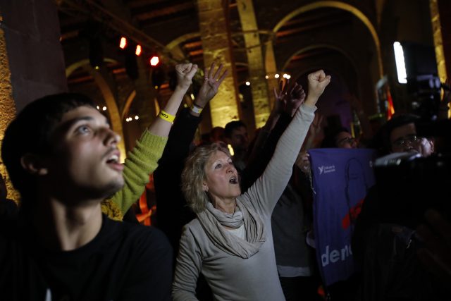 Catalan independence supporters celebrate at the ANC headquarters (Emilio Morenatti/AP)