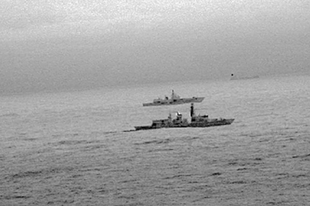 Royal Navy frigate HMS St Albans escorting a Russian warship through the North Sea (MoD/PA)