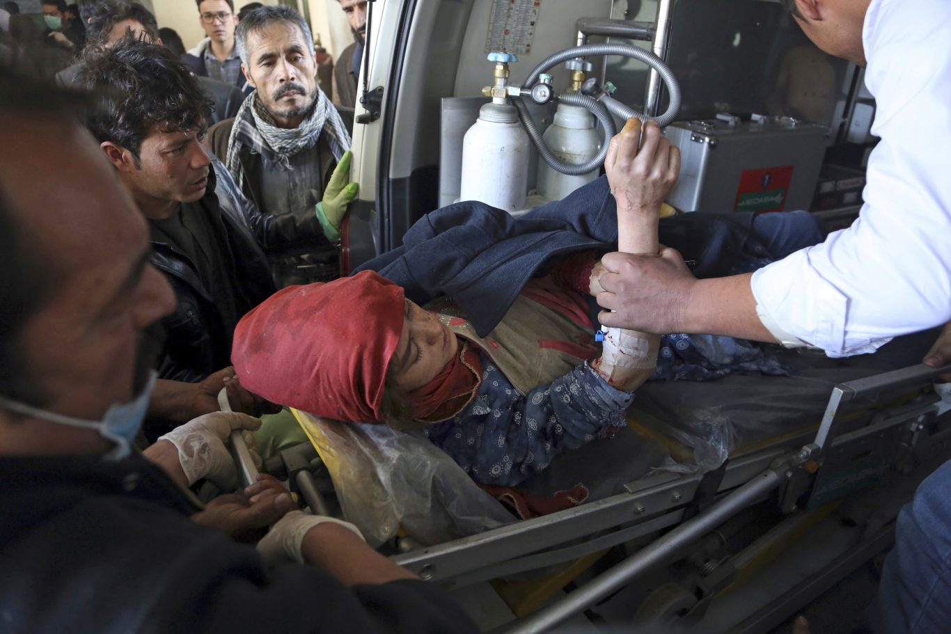 Scores killed in Isis bombing of Kabul news agency and Shia centre