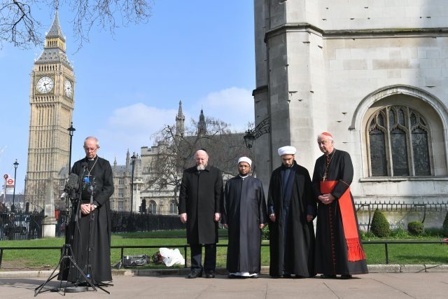 From left, Archbishop of Canterbury Justin Welby, Chief Rabbi Ephriam Mirvis, Sheikh Ezzat Khalifa, Sheikh Mohammad al Hilli and Cardinal Vincent Nichols, Archbishop of Westminster, take part in a vigil outside Westminster Abbey, London, for the victims of the Westminster terror attack (Victoria Jones/PA)