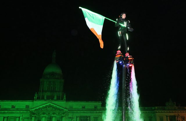 Members of Flyboard Ireland take part in the Liffey Lights Moment - Matinee in Dublin's city centre (Brian Lawless/PA)