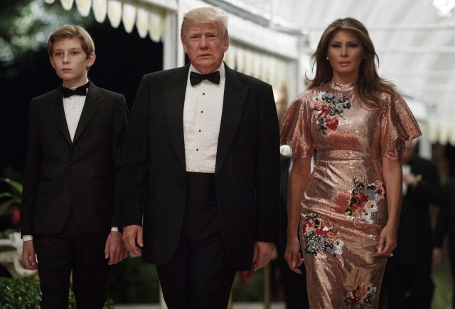 Donald Trump arrives for a New Year's Eve gala at his Mar-a-Lago resort (Evan Vucci/AP)