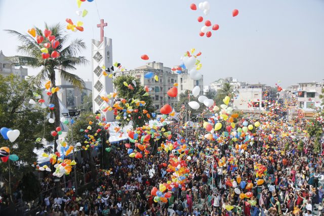 Balloons are released to celebrate the New Year in Ahmadabad, India  (Ajit Solanki/AP)