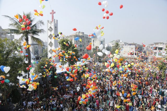 Balloons are released to celebrate the New Year in Ahmadabad, India (Ajit Solanki/AP)