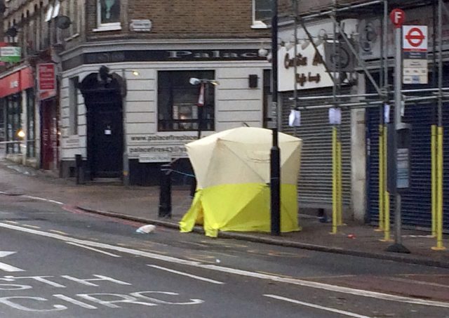 A police tent is erected in Norwood Road in Tulse Hill (Luke Mintz/PA)