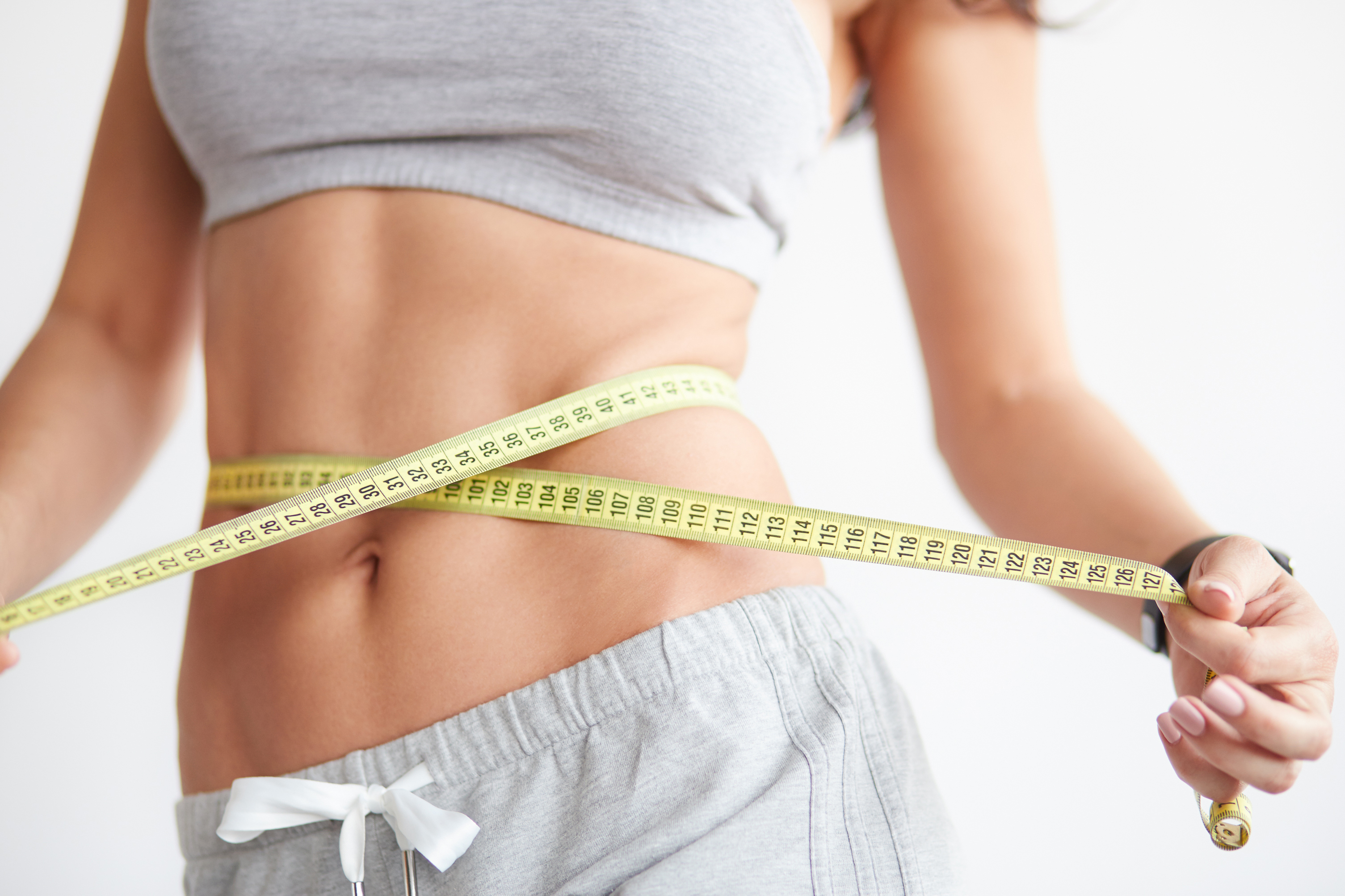 Generic image of a woman with a tape measure around her waist (Thinkstock/PA)