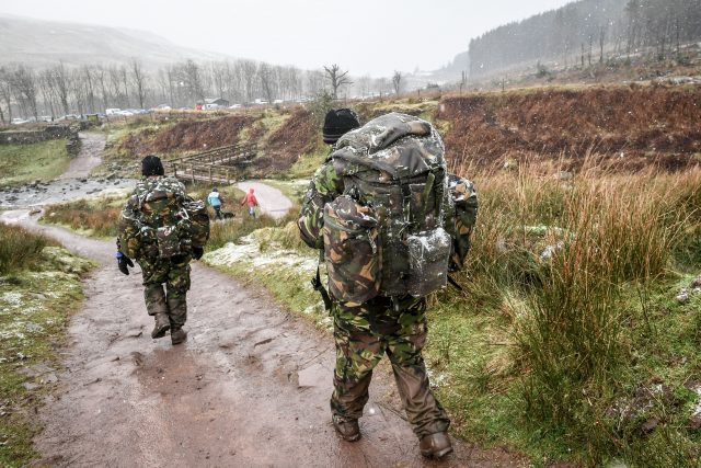 Some of those braving Pen y Fan were attempting the Fan Dance, a 24km SAS Selection test march (Ben Birchall/PA)