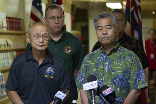 Vern Miyagi, Administrator, HEMA, left, and Hawaii Governor David Ige addressed the media (George F. Lee /The Star-Advertiser via AP)