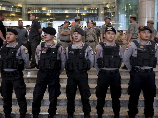 Police guard the entrance 