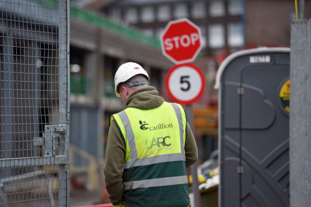 A Carillion worker on site in Smethwick (Joe Giddens/PA)