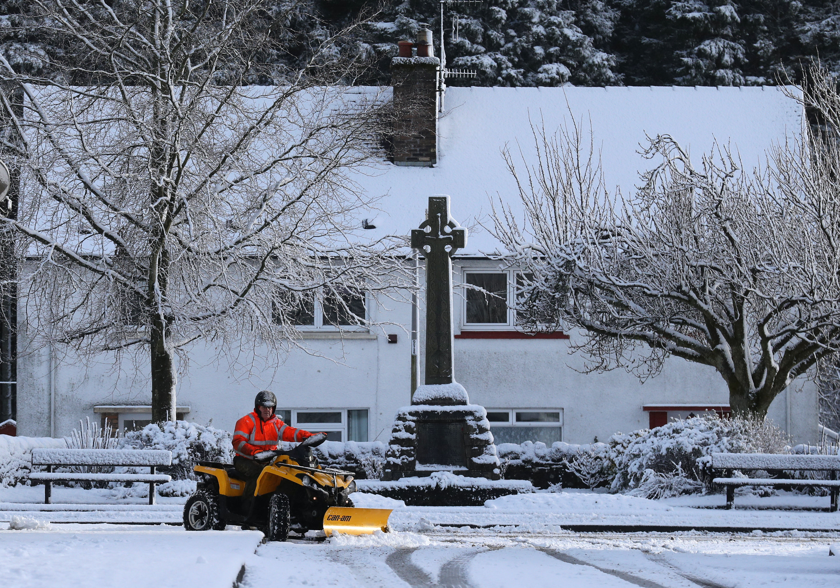 Jim Dunbar clears the snow in Perthshire (Andrew Milligan/PA)