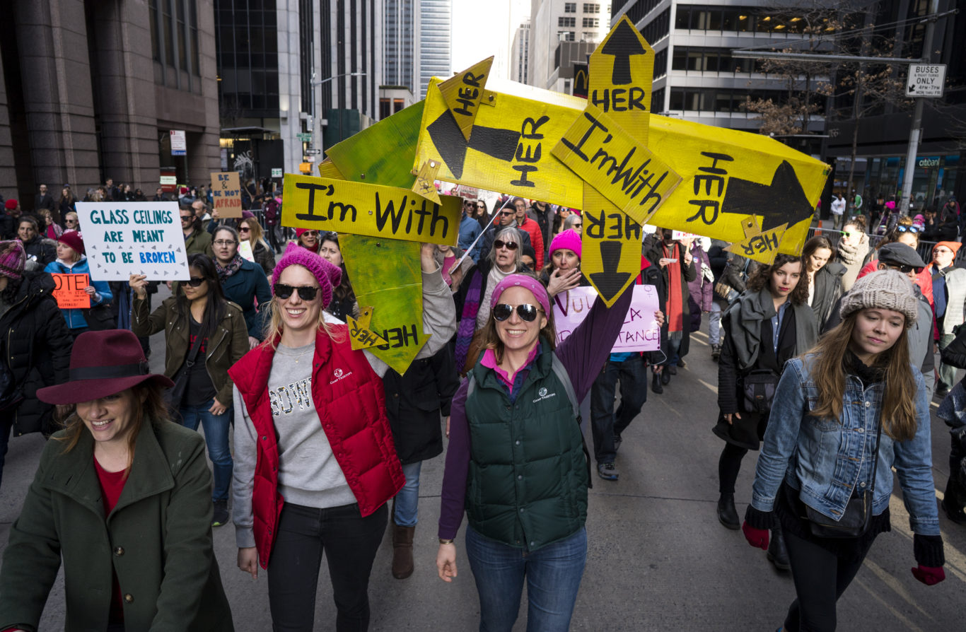 Two women hold an I'm with her sign in New York ( Craig Ruttle/AP)