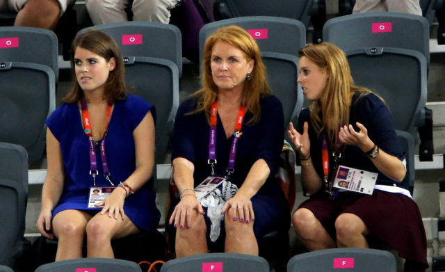 Eugenie, her mother and sister Beatrice watch Chris Hoy celebrates winning the Men's Keirin final in the 2012 London Olympics (Andrew Milligan/PA)