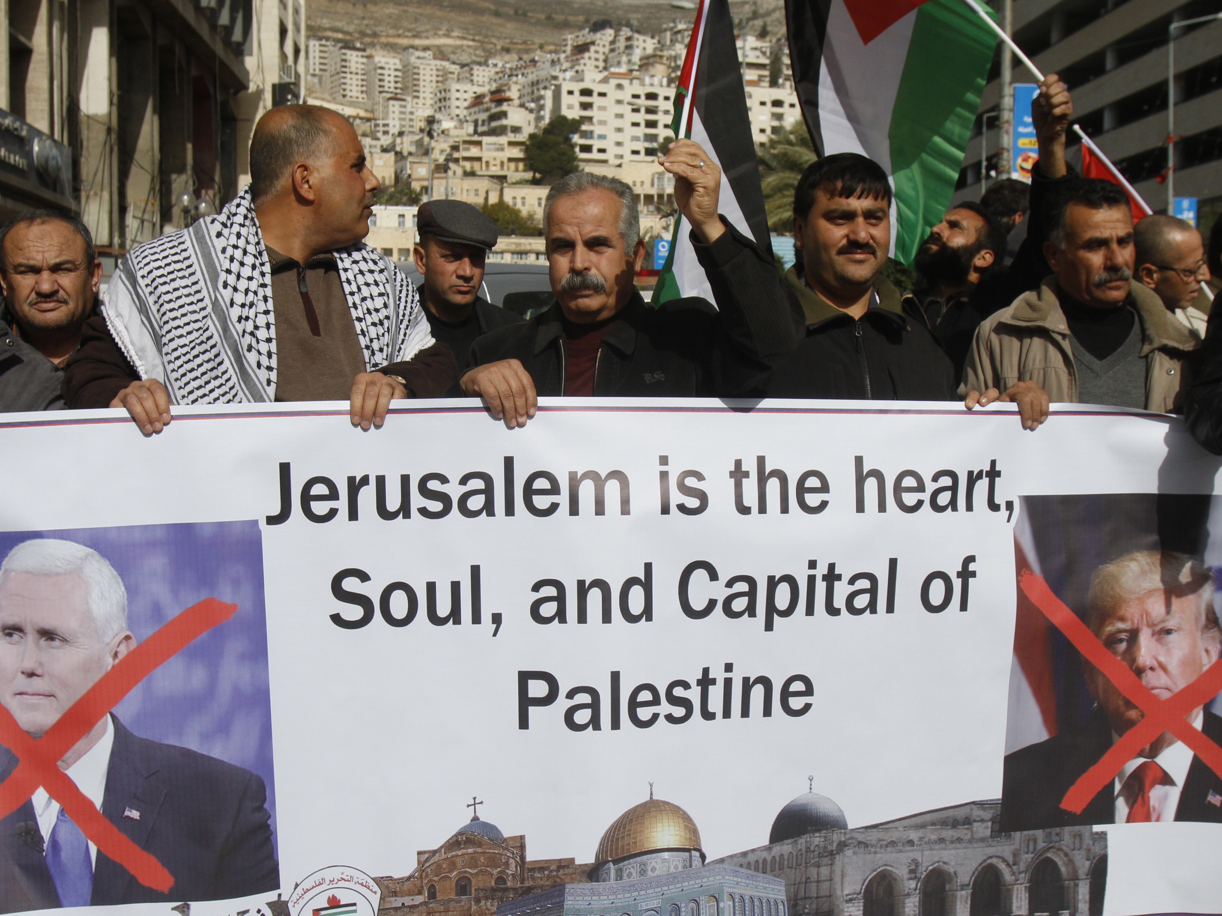 Palestinian protesters vent their anger at Mike Pence's visit (Majdi Mohammed/AP)