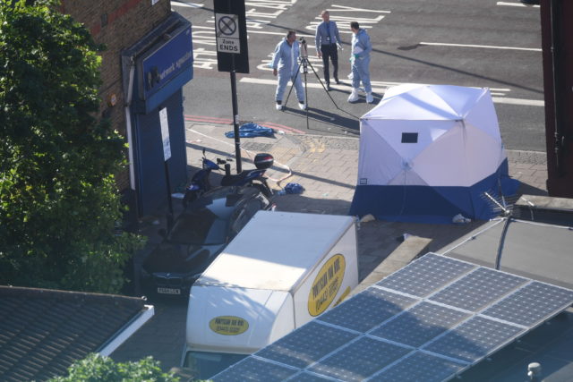 A forensic tent stands next to a van in Finsbury Park, north London, after Makram Ali, 51, died following an alleged  terror attack (Victoria Jones/PA)