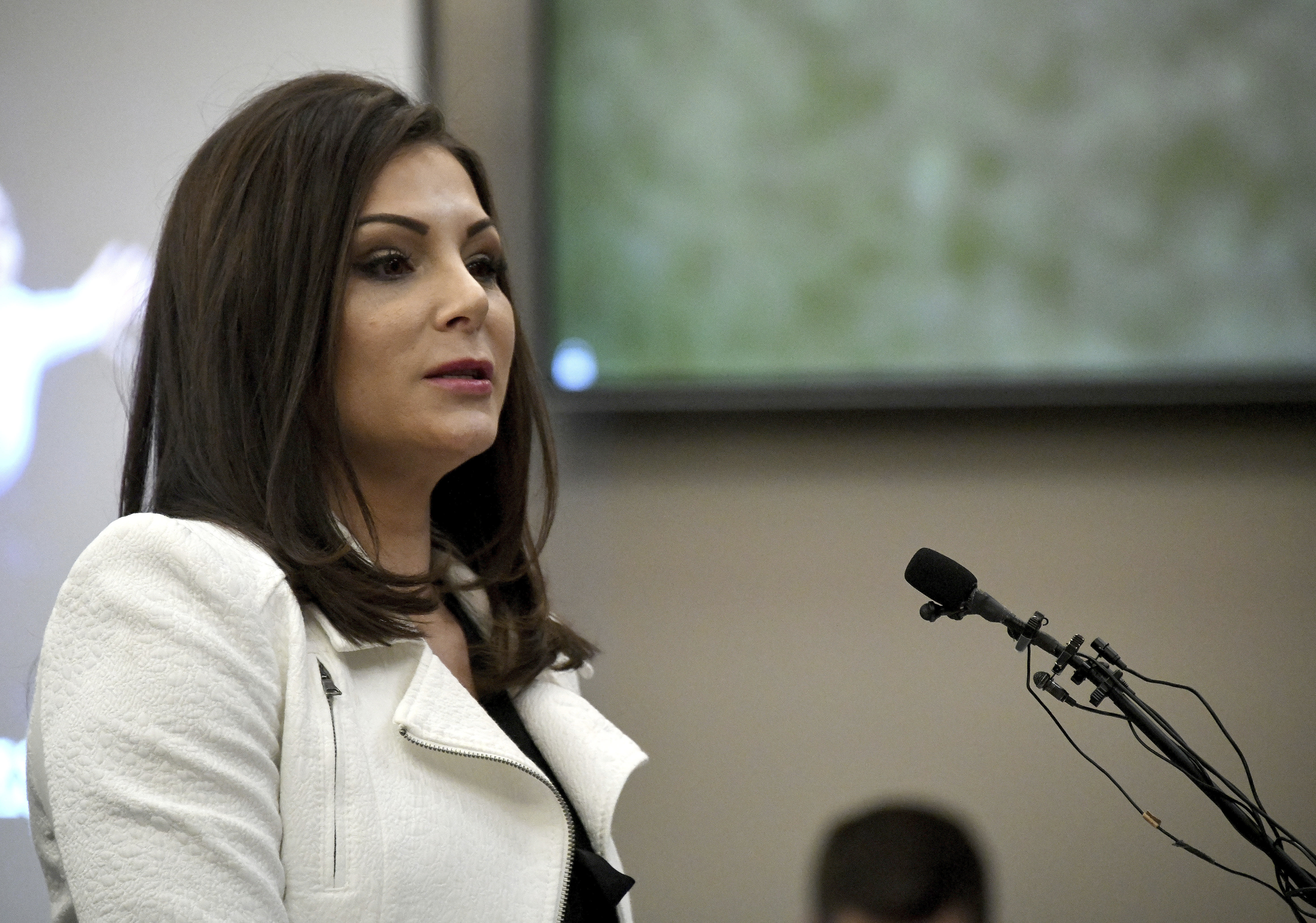 Jamie Dantzscher makes her victim impact statements in Lansing, Michigan (Dale G Young/Detroit News via AP)