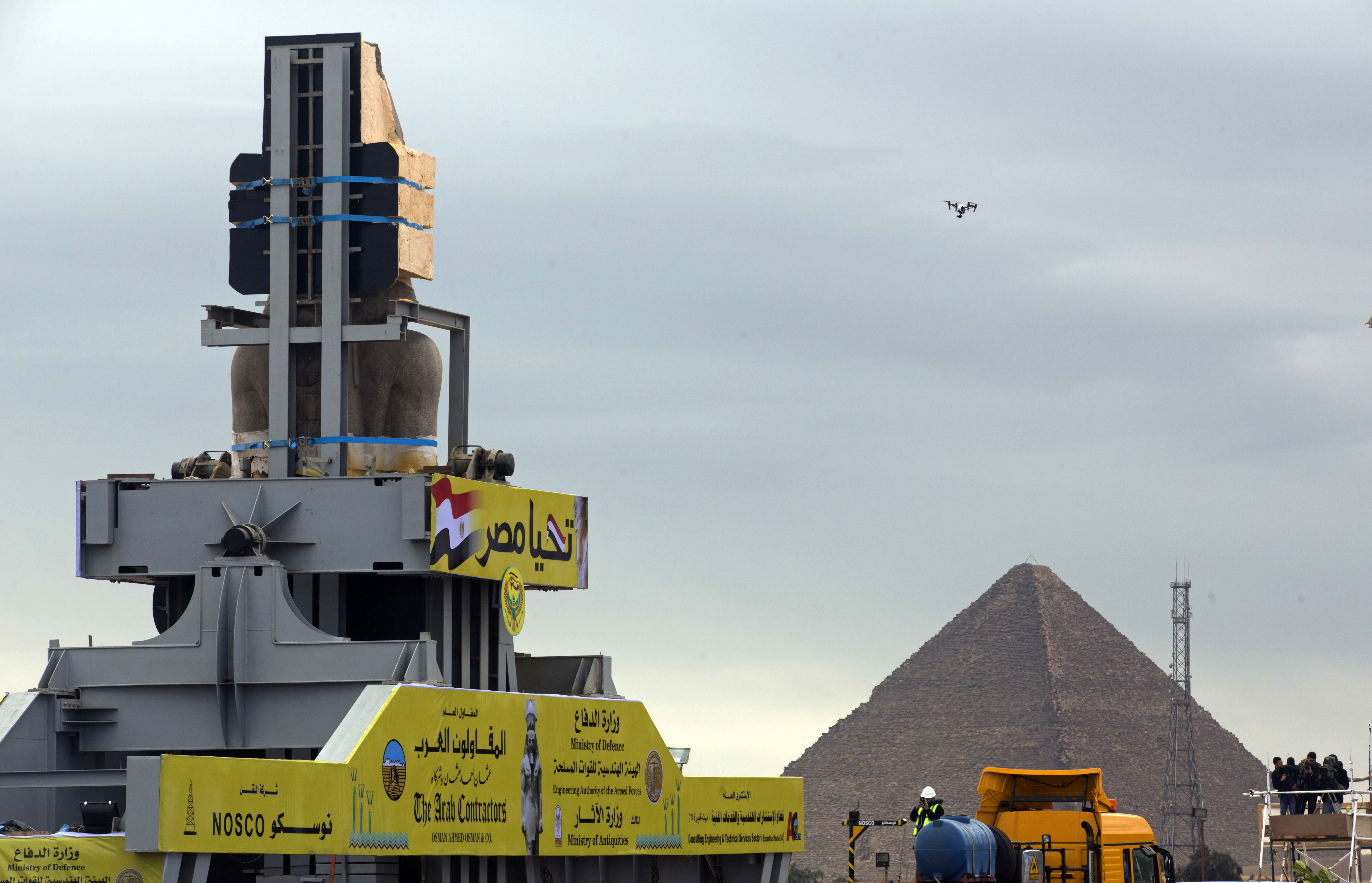 A drone hovers as a statue of Egyptian Pharaoh Ramses II is relocated (Amr Nabil/AP)