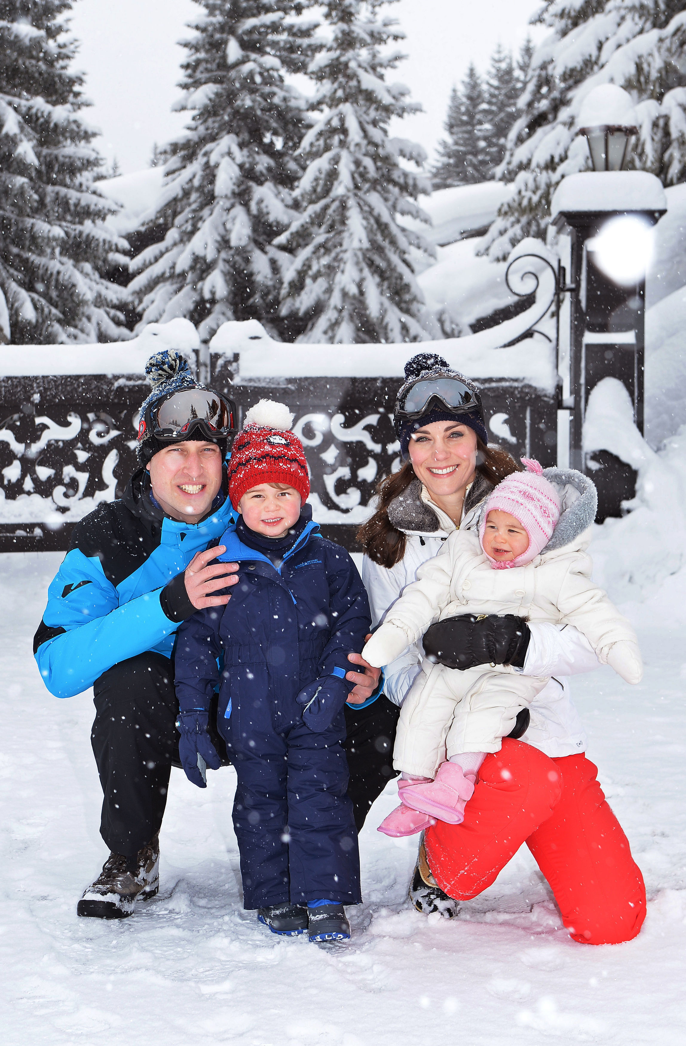 The Duke and Duchess of Cambridge with their children, Prince George and Princess Charlotte, during a short private break skiing in the French Alps in 2016 (John Stillwell/PA)