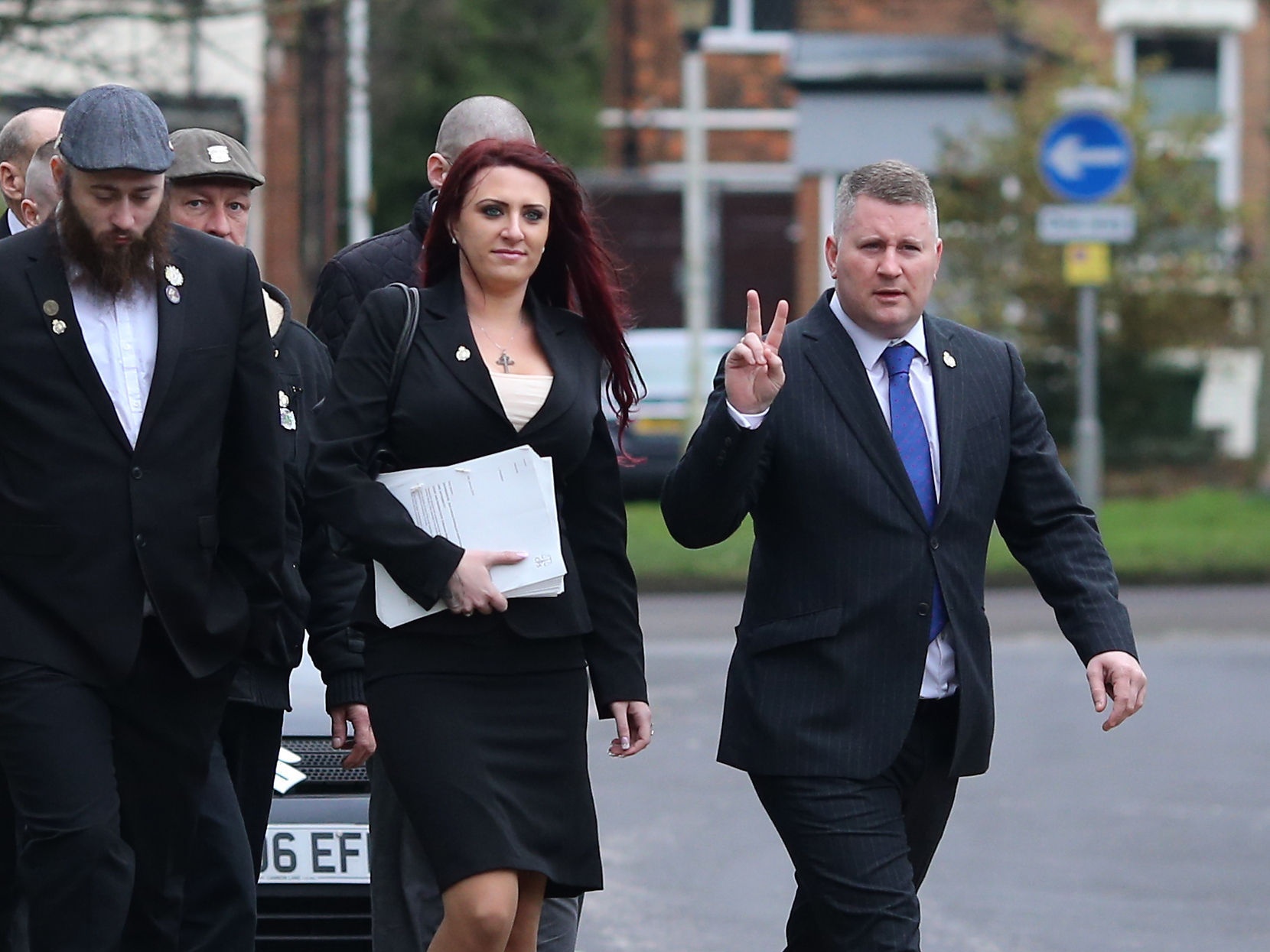 Jayda Fransen and Paul Golding (right) with supporters (Gareth Fuller/PA)