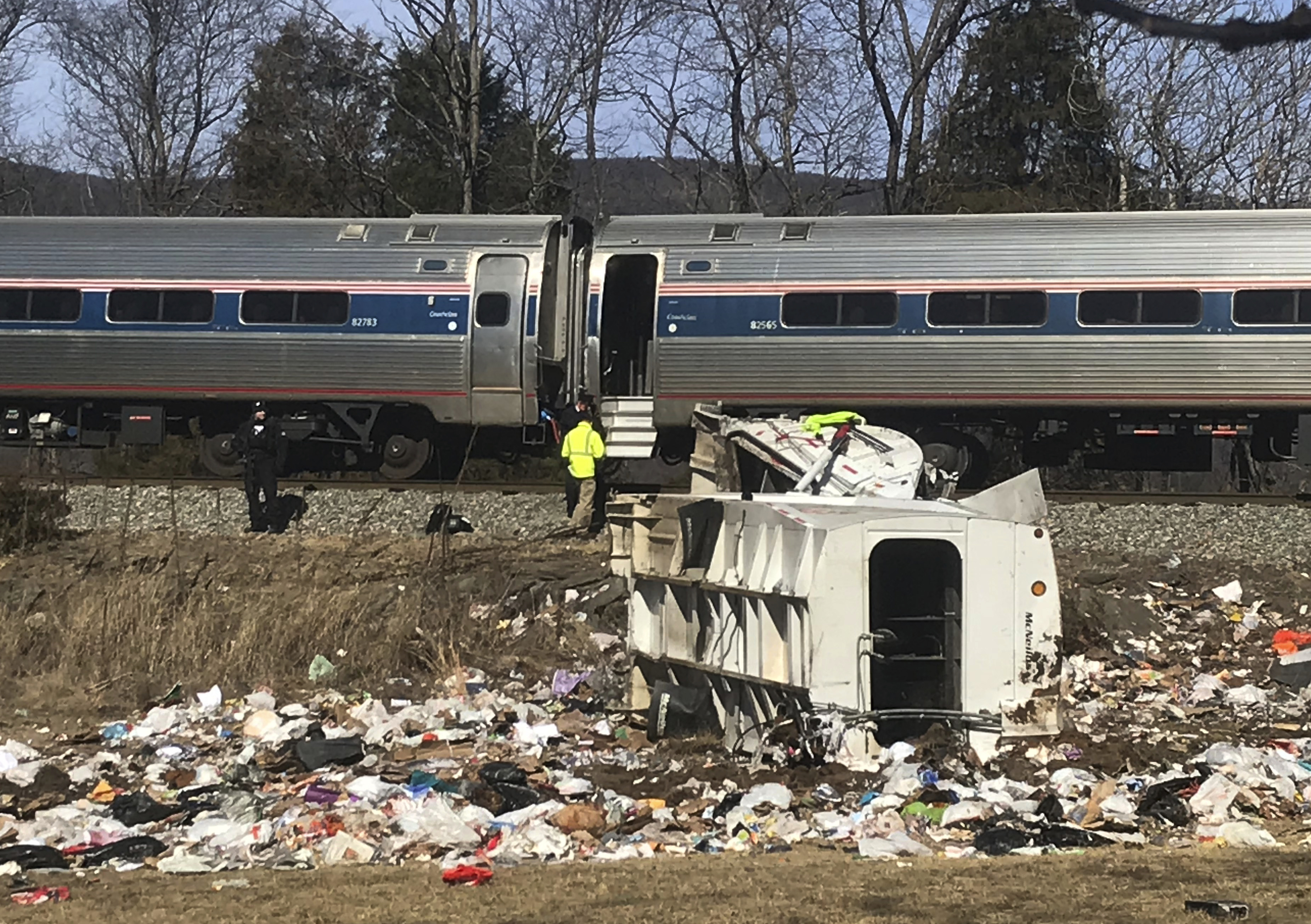 Emergency personnel work at the scene of a train crash in Virginia (Zack Wajsgrasu/The Daily Progress via AP)