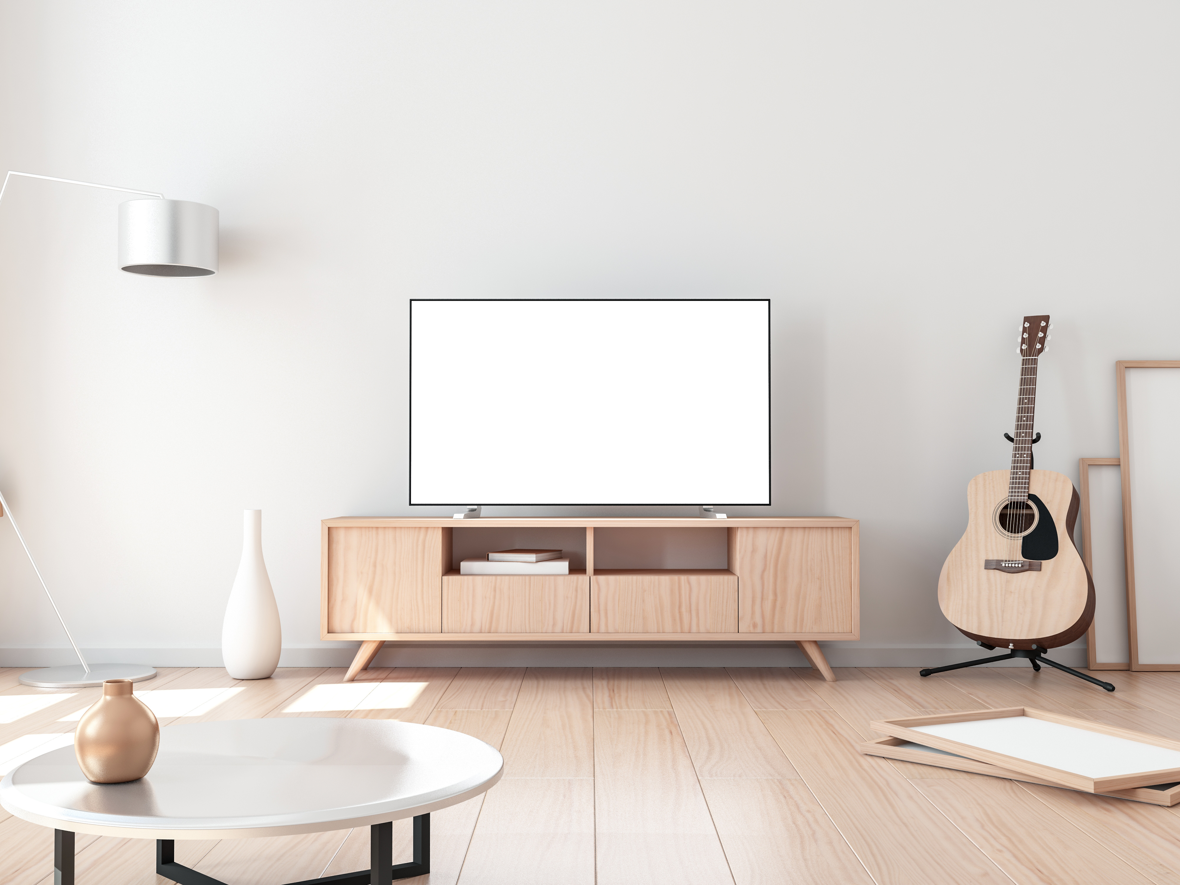 A living room with a television and a guitar