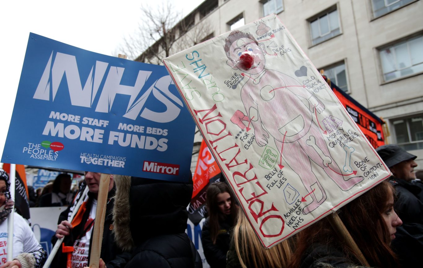 8 of the most creative placards seen at the NHS march | Guernsey Press