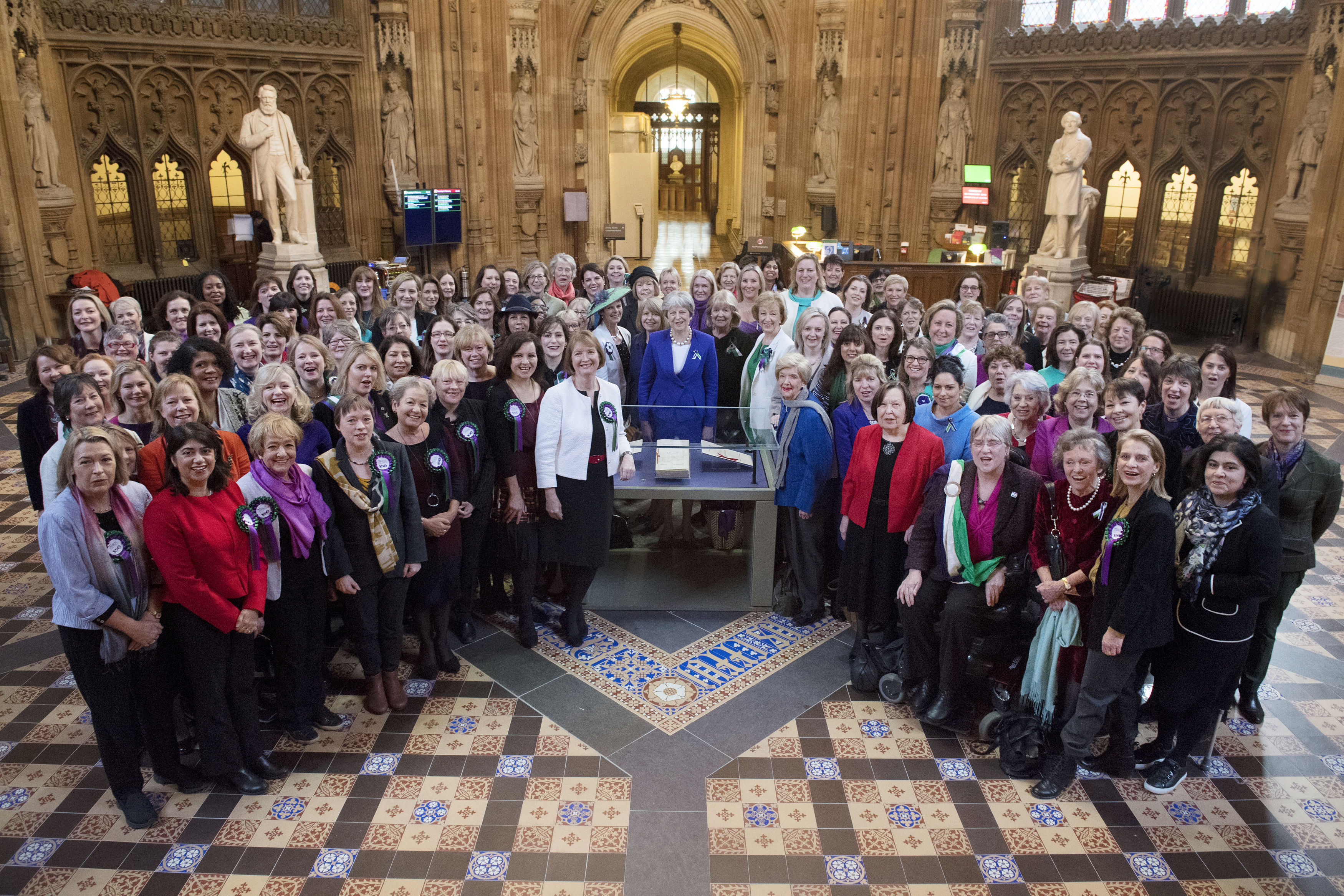 Prime Minister Theresa May joins female Members of both Houses at the Palace of Westminster, London to mark the 100th anniversary of the passing of the Representation of the People Act (UK Parliament/Jessica Taylor/PA)