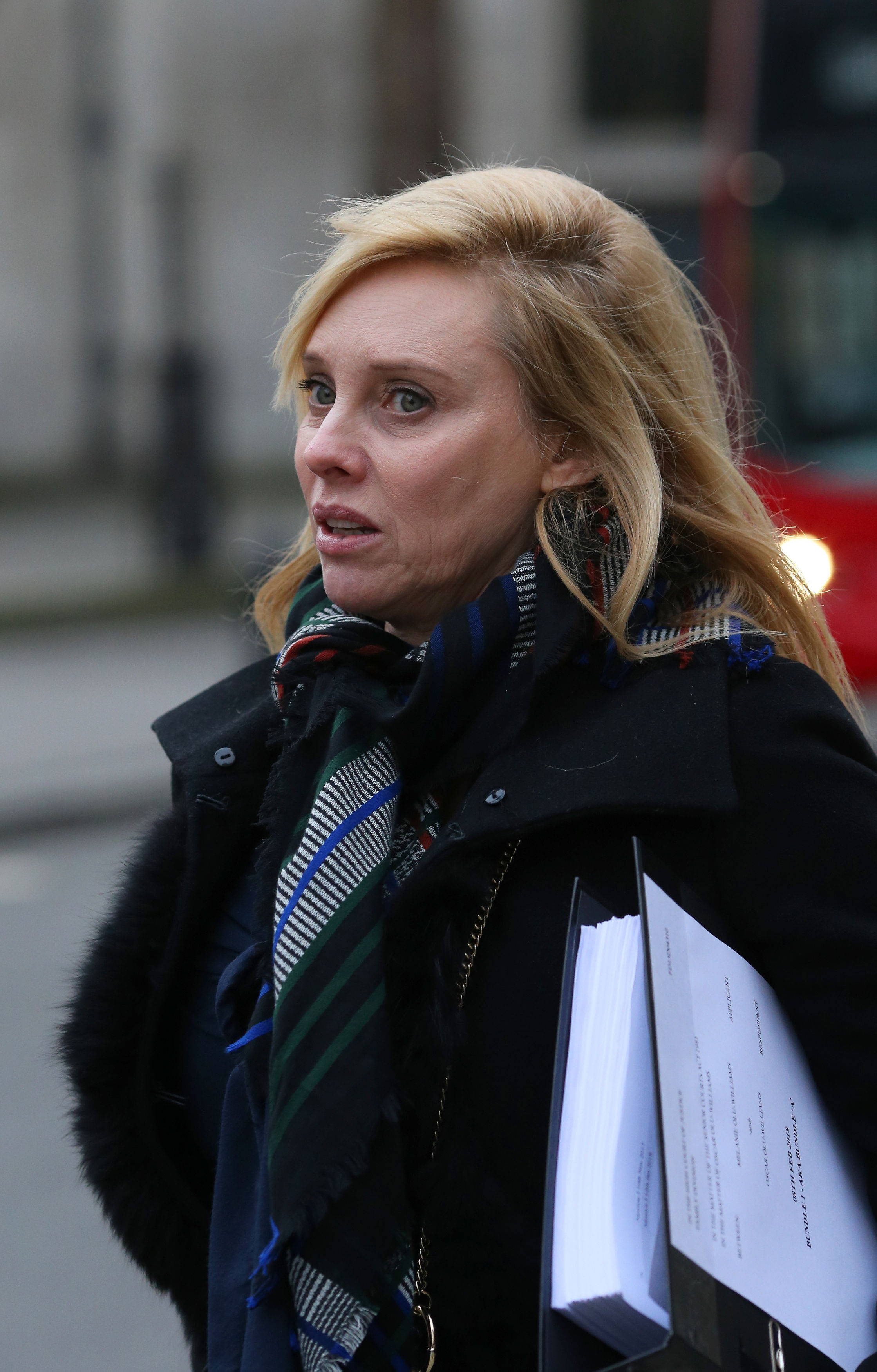 Melanie Olu Williams leaves the High Court in London (Gareth Fuller/PA)