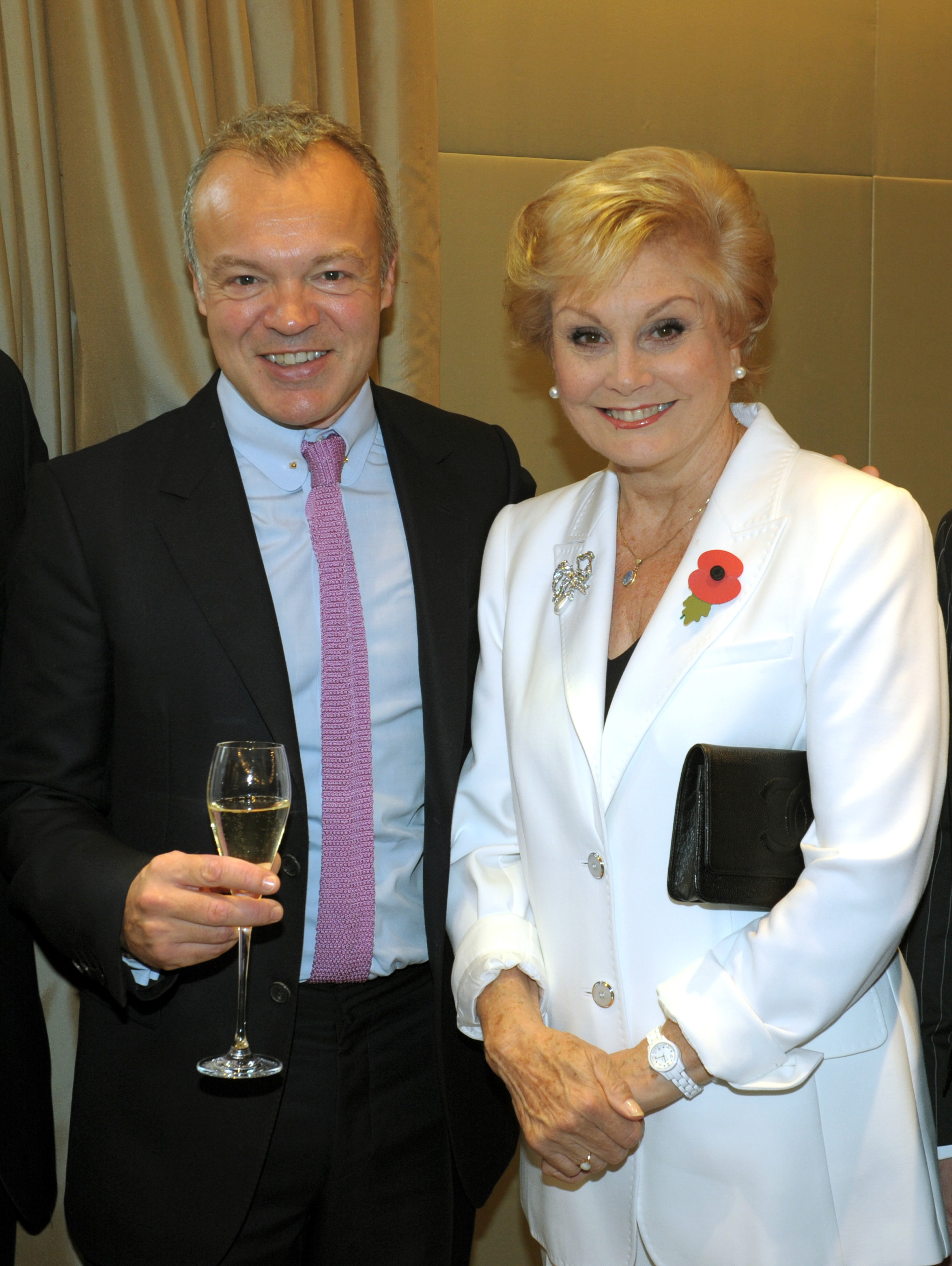 Graham Norton with Angela Rippon in 2013 (Anthony Devlin/PA)