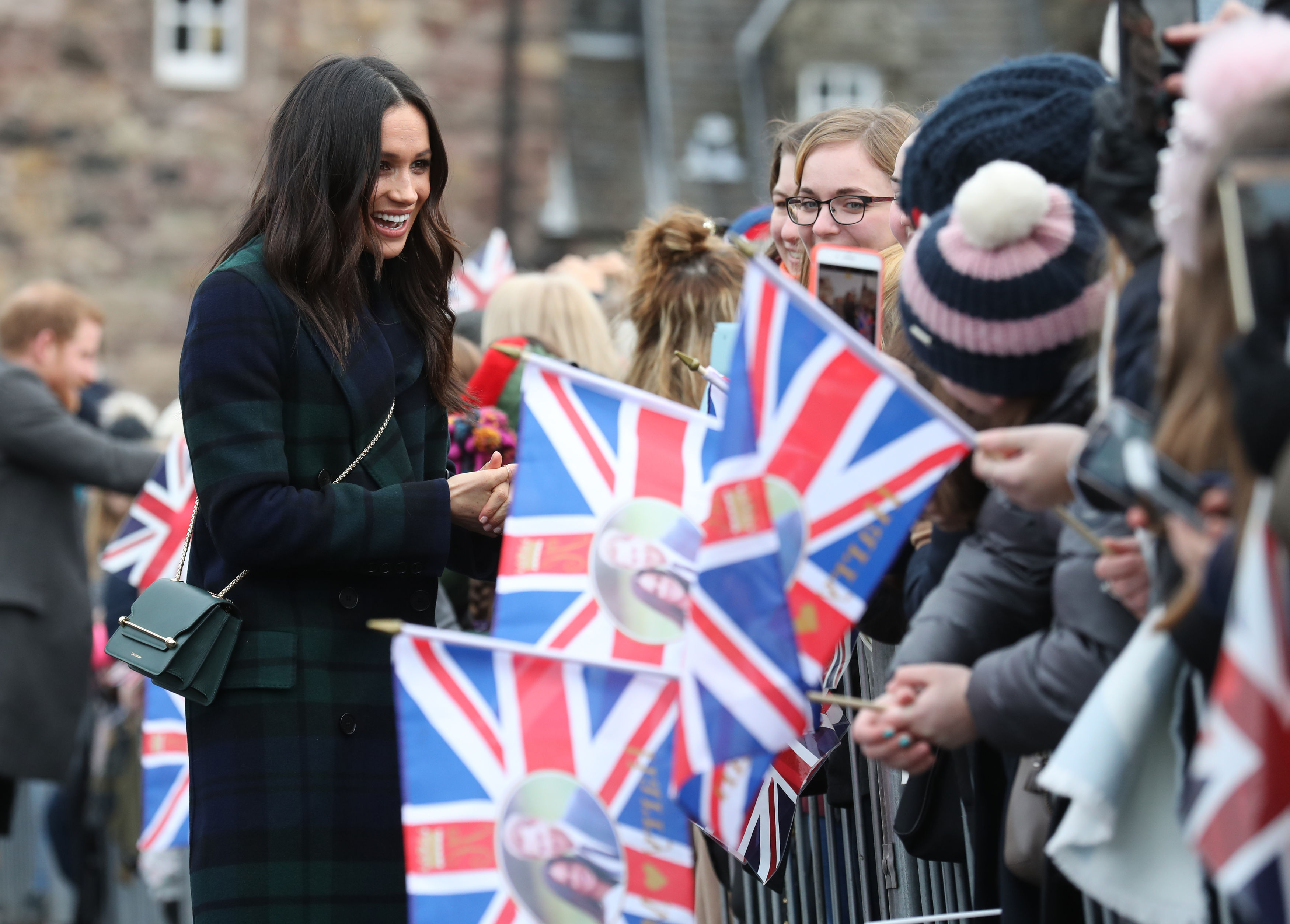 Flags were out for Meghan Markle during her walkabout (Andrew Milligan/PA)