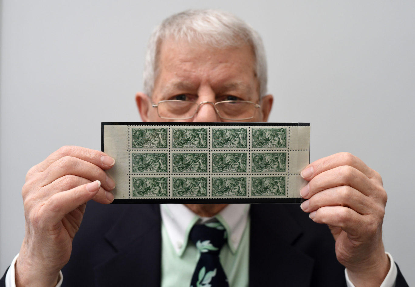 collection of twelve SG 403 £1 green stamps, 1913 Waterlow Printing seahorse issue, worth £125,000 (Kirsty O'Connor/PA)