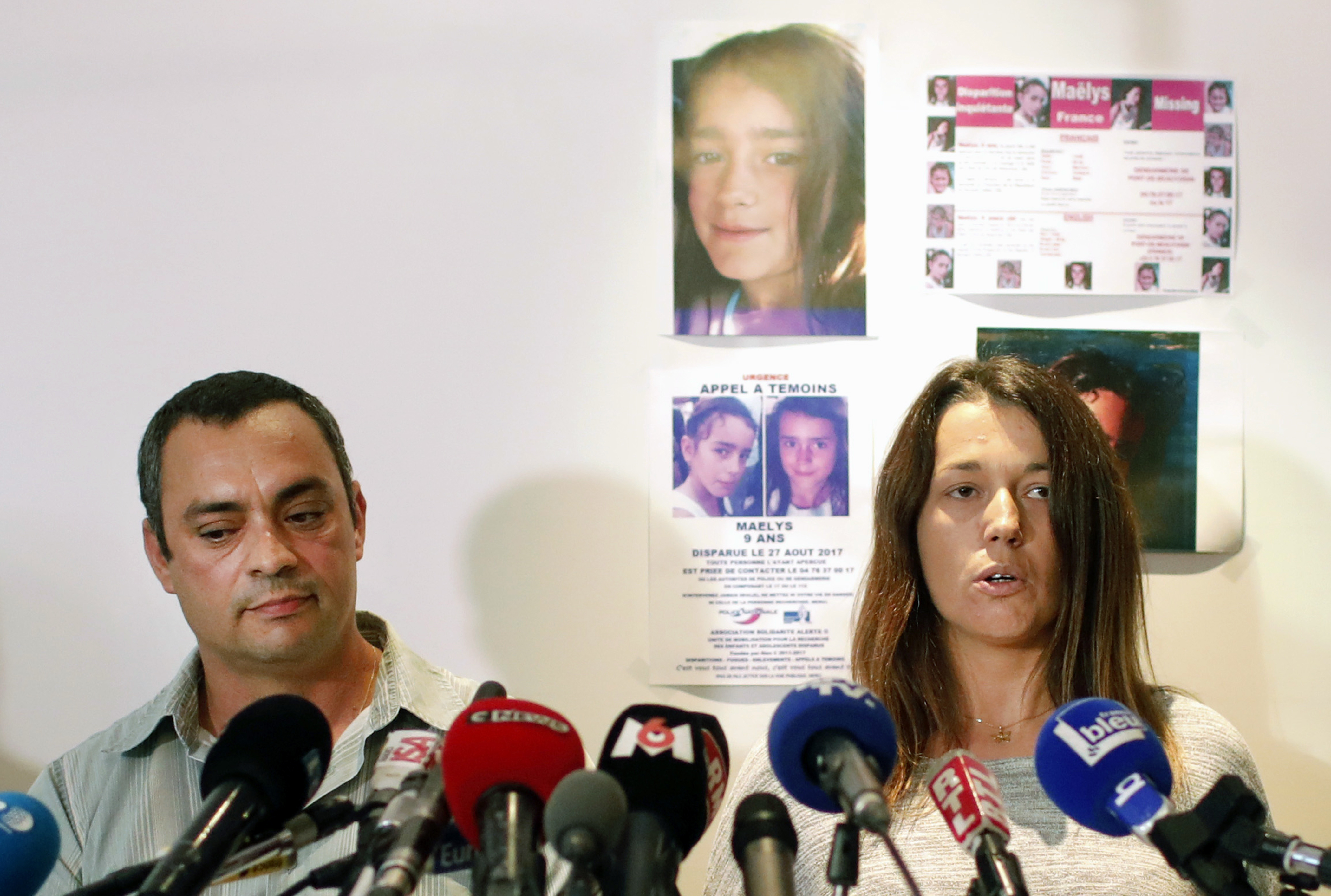 The father of Maelys, Joachim de Araujo, left, and his wife Jennifer at a press conference in Lyon after her disappearance (Laurent Cipriani/AP)
