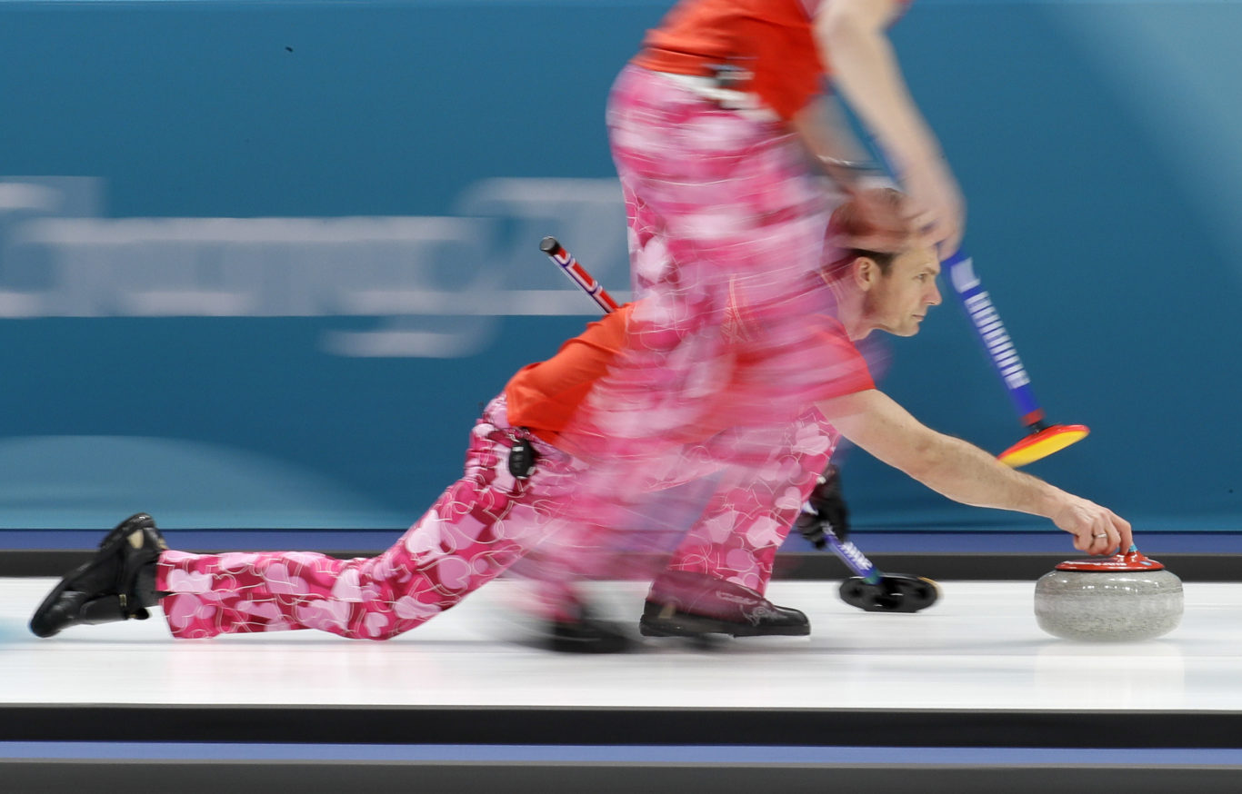 Norway's skip Thomas Ulsrud prepares to push the stone (Aaron Favila/AP)