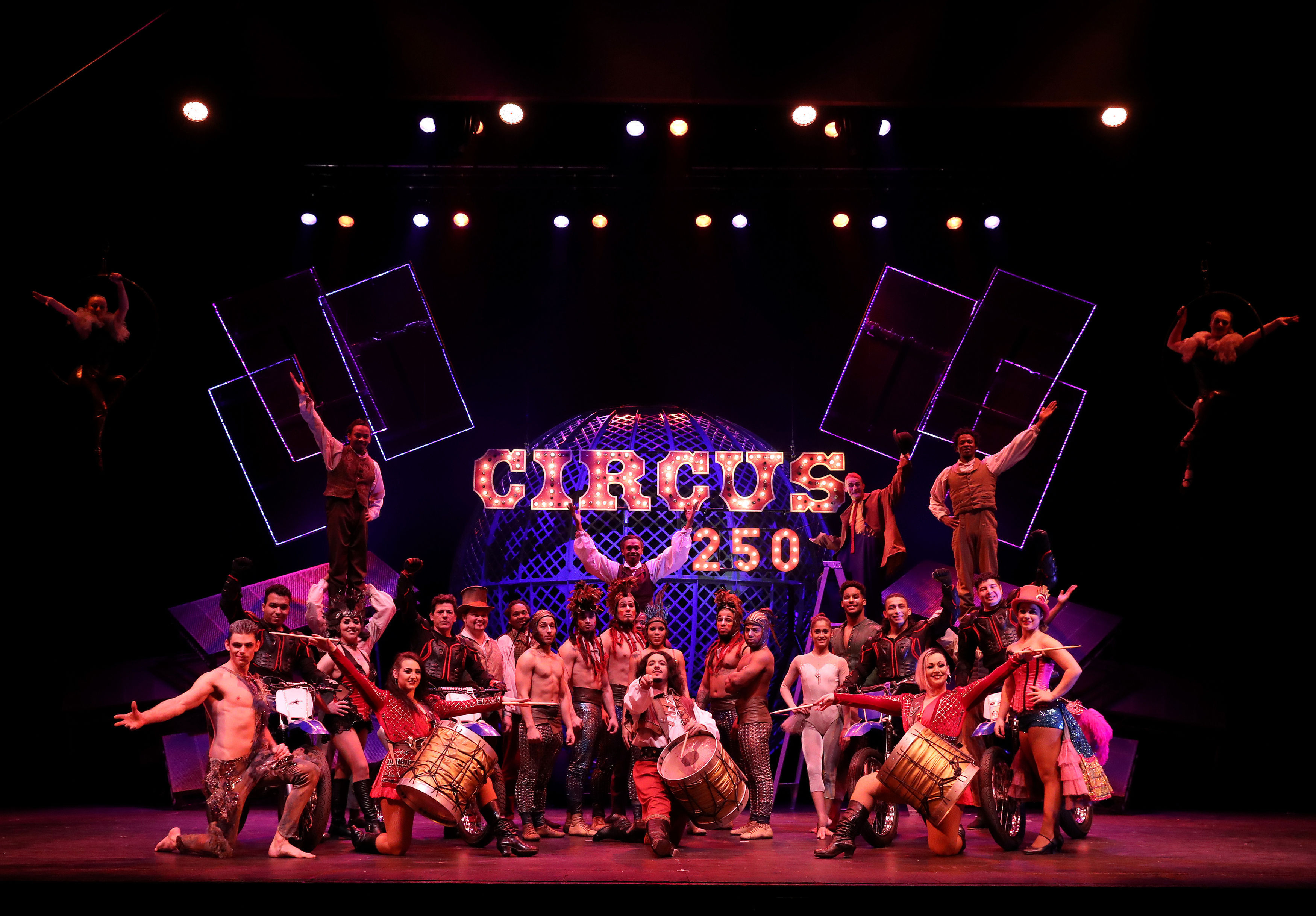 It is a team effort as the Cirque Berserk cast pose together (Andrew Milligan/PA)