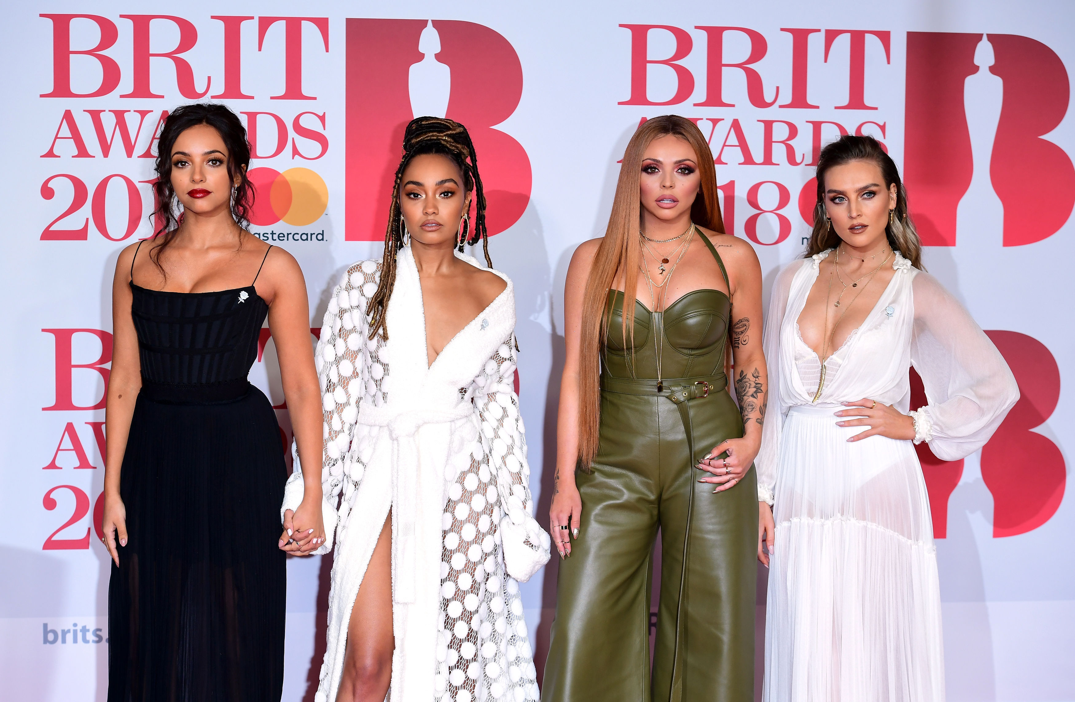 Little Mix's Perrie Edwards, Jesy Nelson, Leigh-Anne Pinnock and Jade Thirlwall arrive (Ian West/PA) 