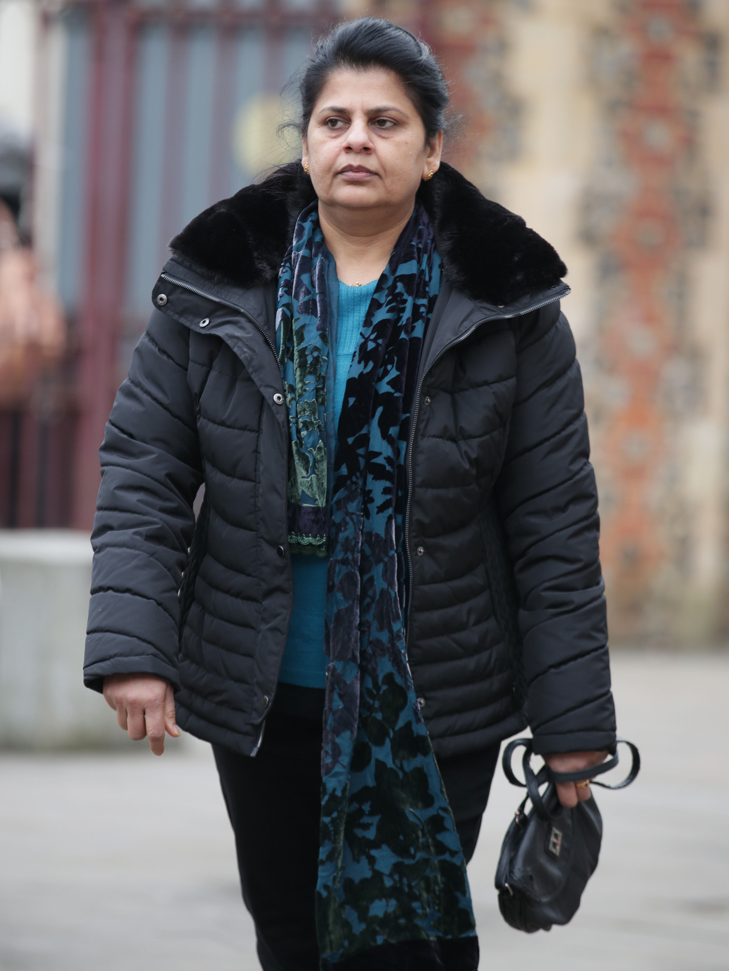 Ancy Joseph, the widow of Cyriac Joseph, arriving at Reading Crown Court (Yui Mok/PA)