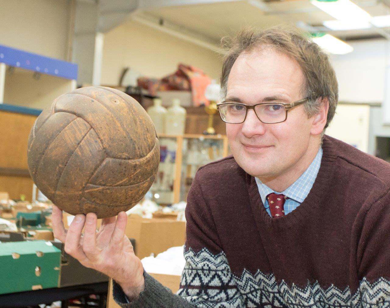 Charles Hanson with the football