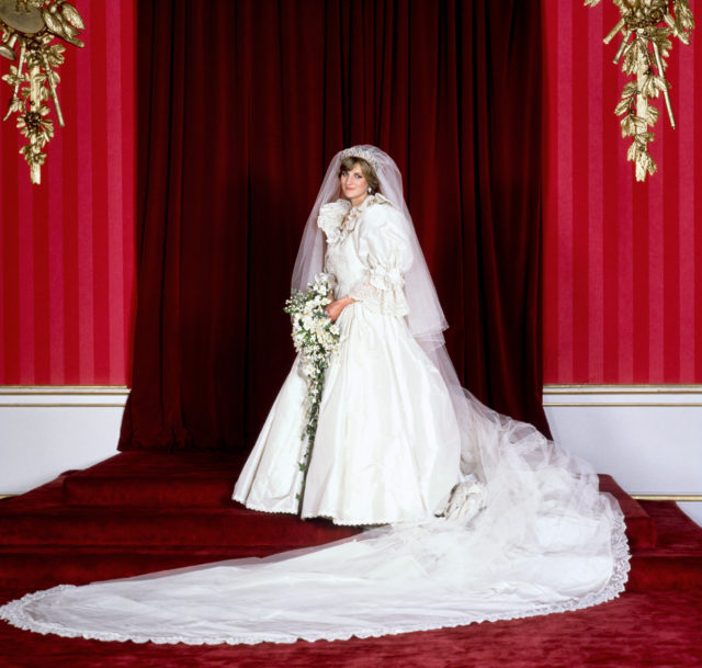 The Princess of Wales in her bridal gown with 25ft train