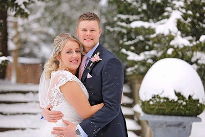 Rebecca McKenzie and Daniel Hodgson tied the knot despite the weather after a community rallied round. (Sarah Thew Photography/PA)