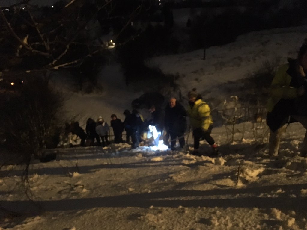 Volunteers in Milnrow, Rochdale, take supplies to people stuck on the M62 (Eleanor Kelly/PA)