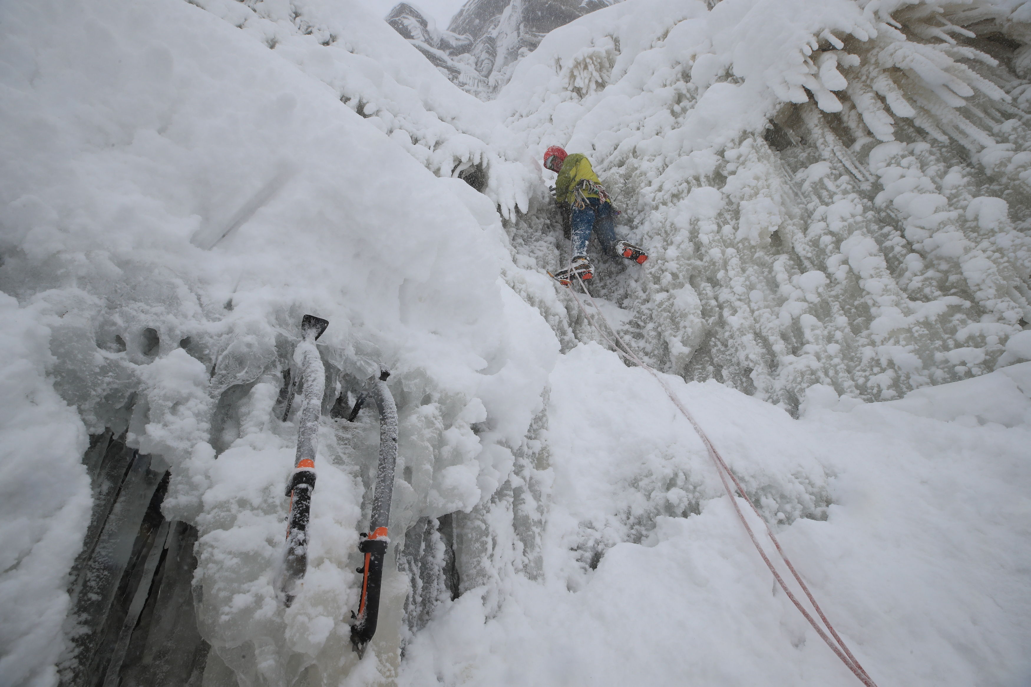 Ice climbers on the downfall at Kinder Downfall, High Peak in Derbyshire