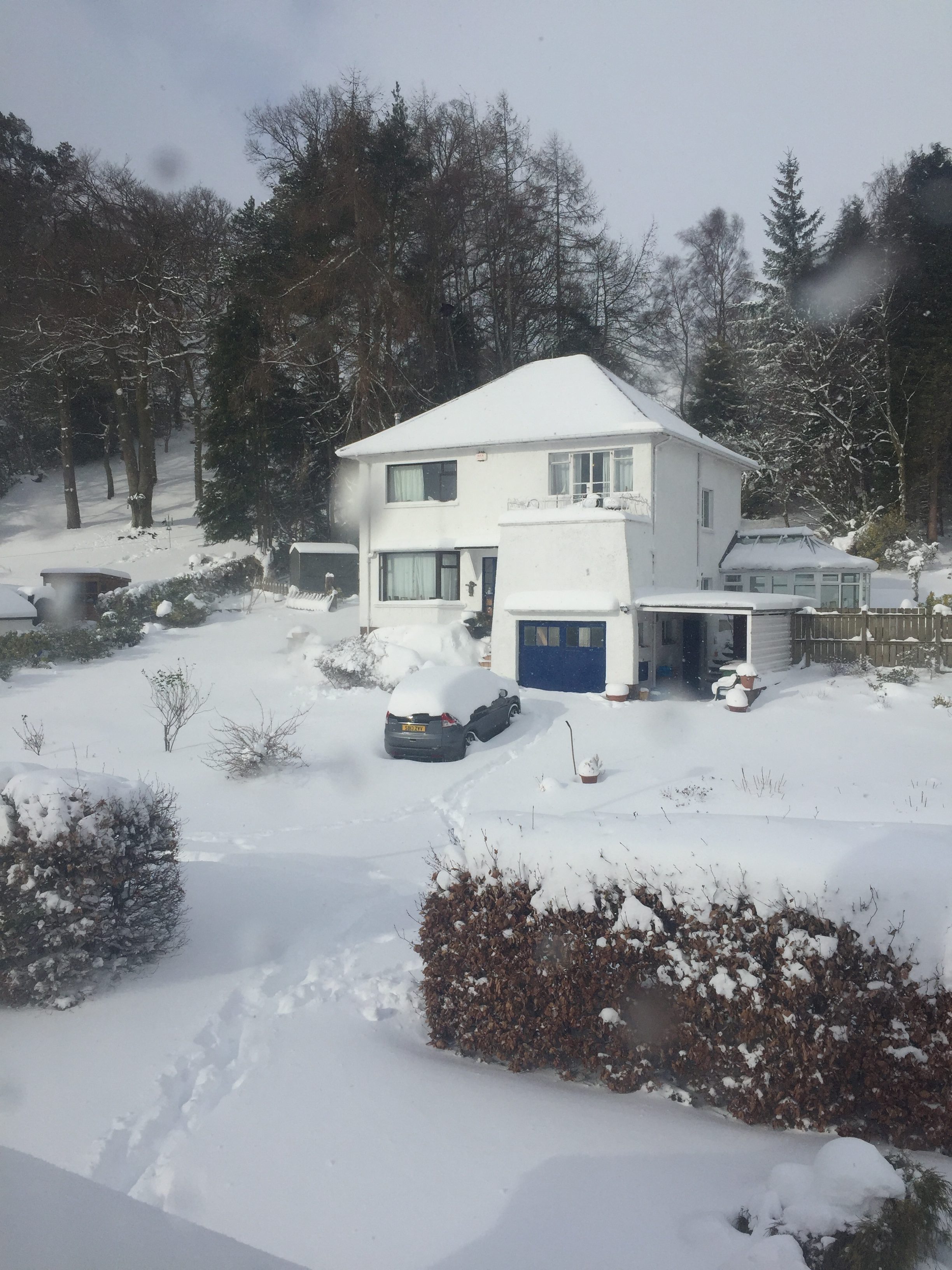 Roads through the village disappeared under snow (Kevin Strain/PA)