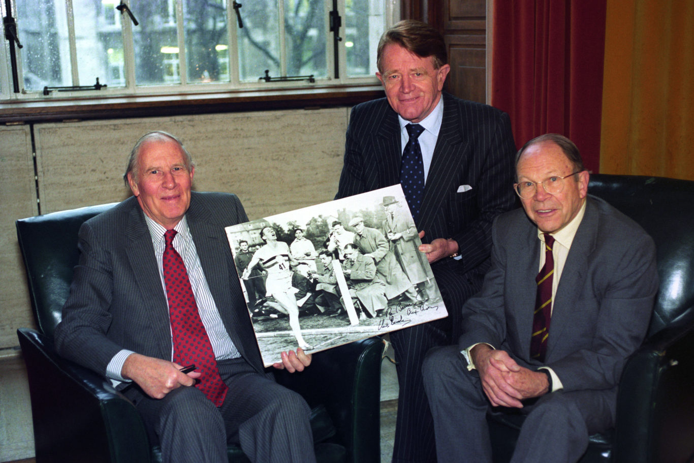 With his two pace men Chris Chataway (centre) and Chris Brasher (Fiona Hanson/PA)